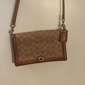 Coach Signature coated canvas with refined calf leather details…NEVER WORN